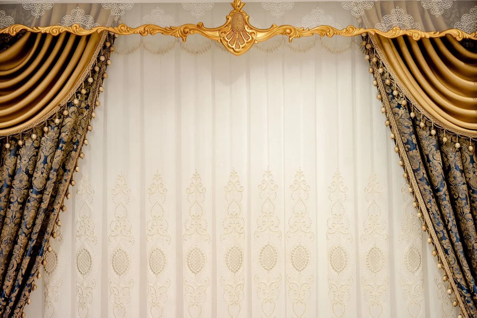 Gold jacquard drapes with a woven pattern